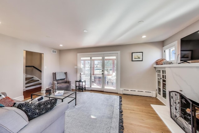 360 W Maple St, Lombard, IL 60148 - living room with visible vents, wood finished floors, stairway, recessed lighting, and a baseboard heating unit