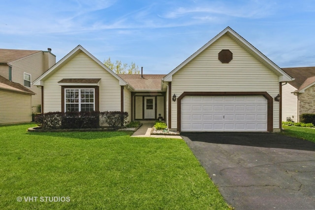 7 N Brittany Ln, Hainesville, IL 60030 - view of front of house with driveway, a front lawn, a garage, and a shingled roof