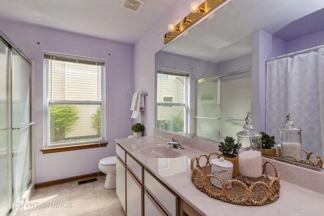7 N Brittany Ln, Hainesville, IL 60030 - bathroom featuring curtained shower, baseboards, toilet, and vanity