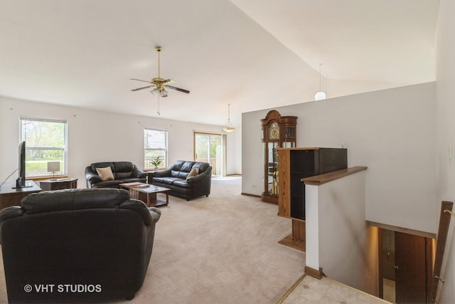 7 N Brittany Ln, Hainesville, IL 60030 - living room with a ceiling fan, vaulted ceiling, and light colored carpet
