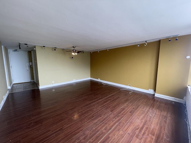 4800 S Chicago Beach Dr Unit 2614N, Chicago, IL 60615 - unfurnished room with track lighting, wood finished floors, baseboards, and ceiling fan