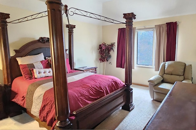 bedroom featuring carpet floors and baseboards