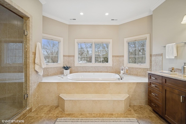 full bath with a garden tub, visible vents, a shower stall, vanity, and tile patterned floors