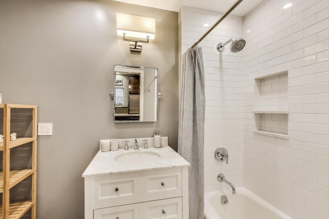 bathroom featuring vanity and shower / tub combo