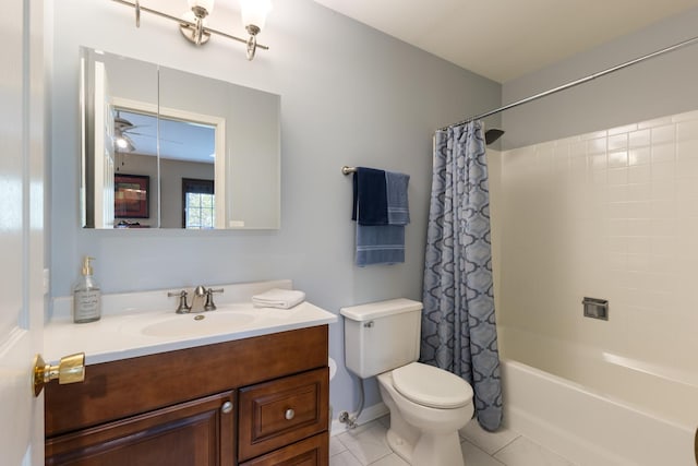 bathroom with vanity, shower / tub combo with curtain, tile patterned floors, and toilet