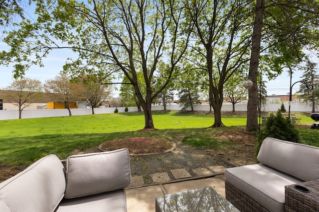 view of yard featuring a patio area and fence