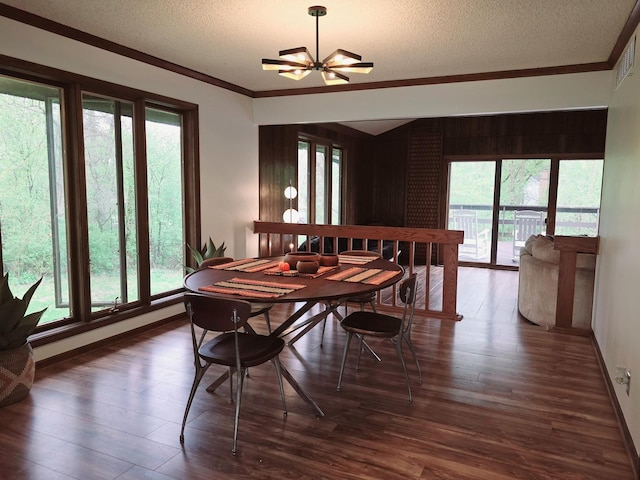 38W443 Woodhill Ln, Saint Charles, IL 60175 - dining space with crown molding, a textured ceiling, and wood finished floors