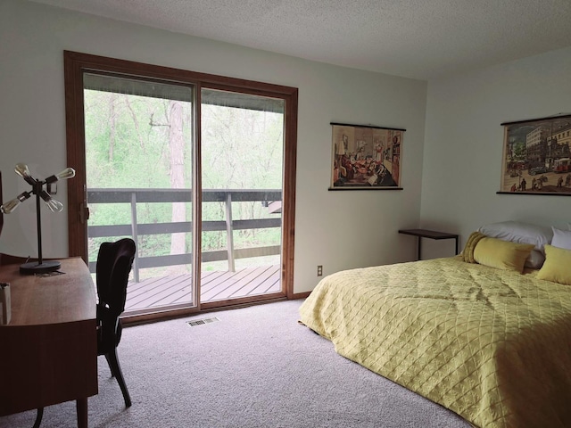 38W443 Woodhill Ln, Saint Charles, IL 60175 - carpeted bedroom with access to exterior, a textured ceiling, and visible vents