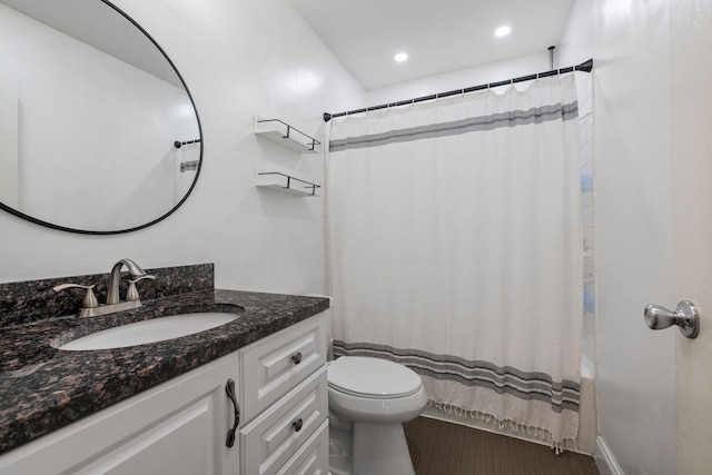 full bathroom with recessed lighting, vanity, toilet, and shower / bath combination with curtain