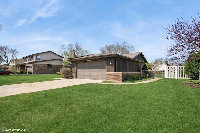view of front of house featuring a front yard, a garage, brick siding, fence, and concrete driveway