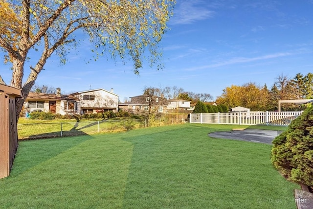 view of yard with fence