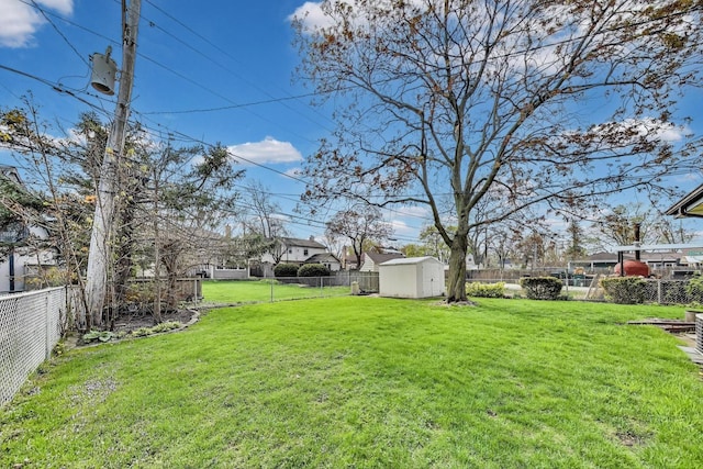 621 N Hamlin Ave, Park Ridge, IL 60068 - view of yard featuring a fenced backyard, a storage unit, and an outdoor structure