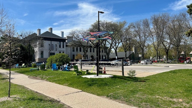 surrounding community with a lawn