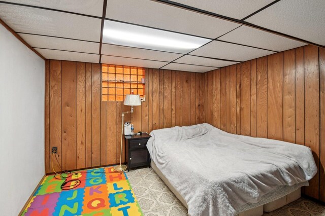5058 S Ridgeway Ave, Chicago, IL 60632 - bedroom featuring wooden walls and a drop ceiling