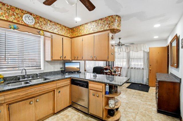 5058 S Ridgeway Ave, Chicago, IL 60632 - kitchen with a ceiling fan, stainless steel dishwasher, open shelves, a sink, and a peninsula