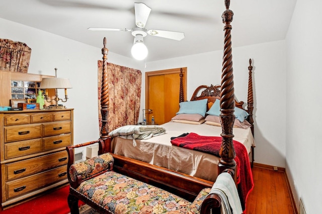 5058 S Ridgeway Ave, Chicago, IL 60632 - bedroom with baseboards, a ceiling fan, and wood finished floors