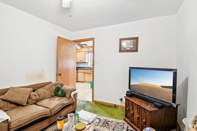 5058 S Ridgeway Ave, Chicago, IL 60632 - living room featuring baseboards, light carpet, and a ceiling fan