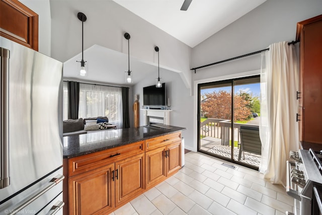 2305 Olde Mill Rd Unit 2305, Plainfield, IL 60586 - kitchen with light tile patterned flooring, high vaulted ceiling, plenty of natural light, brown cabinets, and appliances with stainless steel finishes