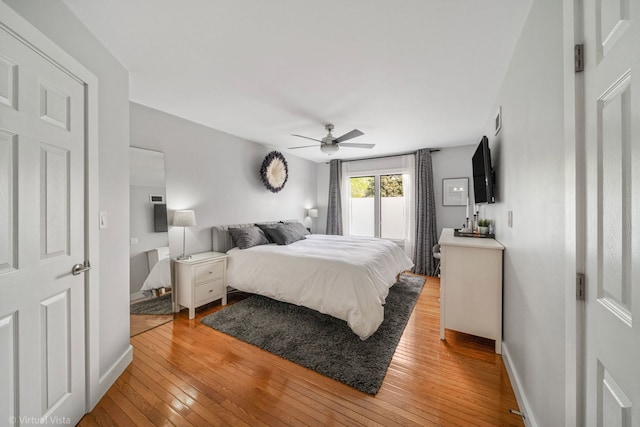 2305 Olde Mill Rd Unit 2305, Plainfield, IL 60586 - bedroom with baseboards, a ceiling fan, light wood-type flooring, and visible vents