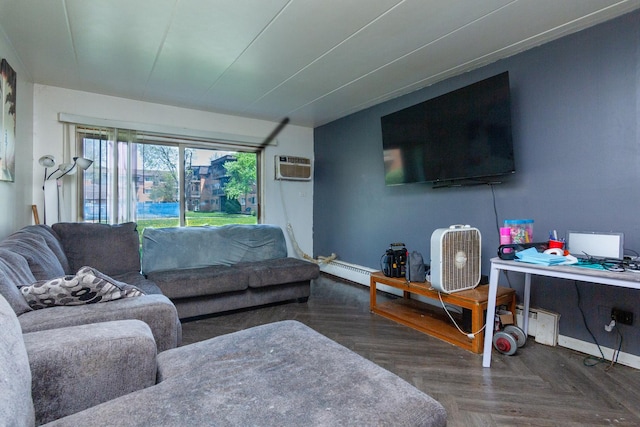 living room with baseboards and a wall unit AC