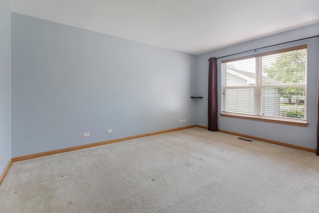 10569 Lansdale St, Huntley, IL 60142 - spare room featuring carpet flooring and baseboards