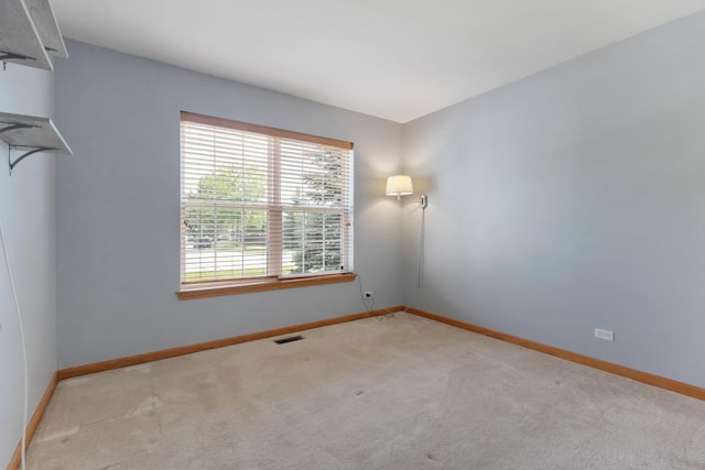 10569 Lansdale St, Huntley, IL 60142 - carpeted empty room with baseboards
