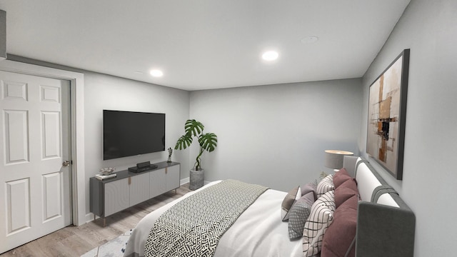 bedroom featuring light wood-style floors, baseboards, and recessed lighting