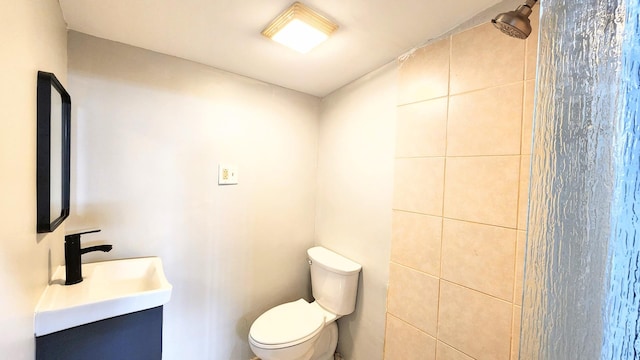full bathroom featuring vanity and toilet