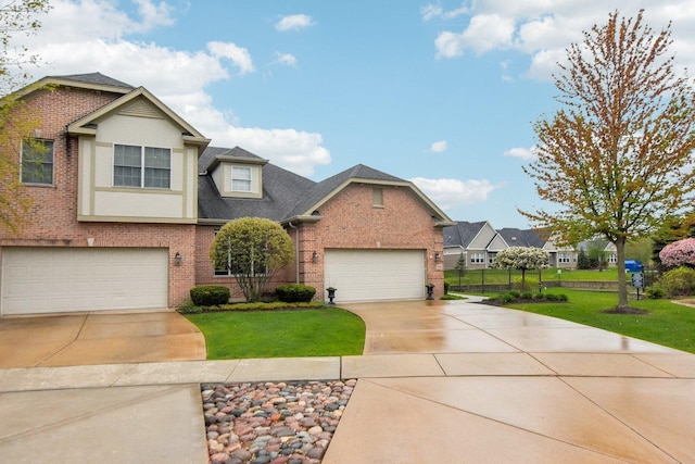 1565 Ashbury Pl, Lemont, IL 60439 - view of front of house featuring brick siding, a shingled roof, a front lawn, and concrete driveway