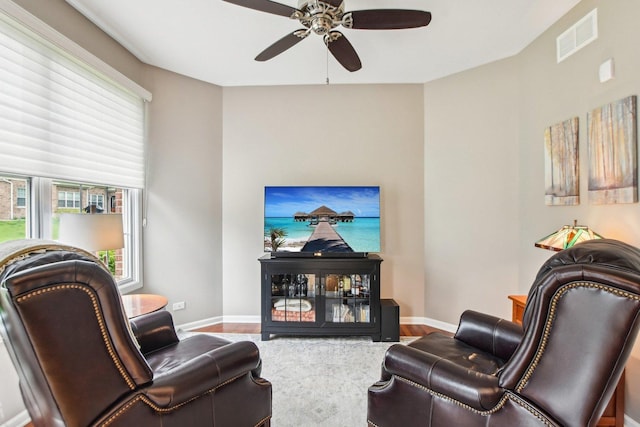 1565 Ashbury Pl, Lemont, IL 60439 - living room with visible vents, a ceiling fan, baseboards, and wood finished floors