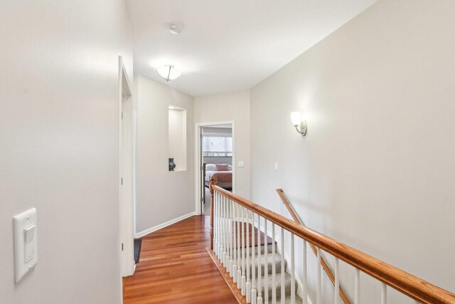 1565 Ashbury Pl, Lemont, IL 60439 - hall with baseboards, light wood finished floors, and an upstairs landing