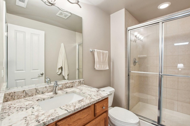 1565 Ashbury Pl, Lemont, IL 60439 - bathroom featuring visible vents, toilet, and a shower stall