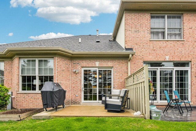 1565 Ashbury Pl, Lemont, IL 60439 - rear view of property featuring brick siding, a patio area, and roof with shingles