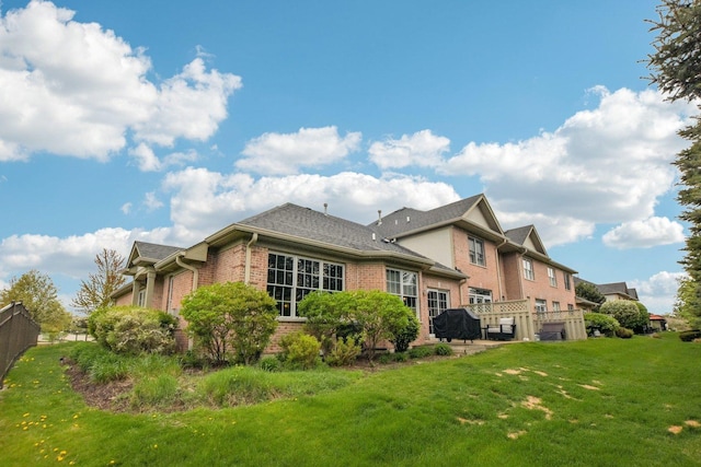 1565 Ashbury Pl, Lemont, IL 60439 - view of side of property with a yard, brick siding, and fence