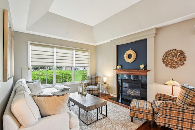 1565 Ashbury Pl, Lemont, IL 60439 - living room featuring baseboards, a fireplace with flush hearth, and wood finished floors
