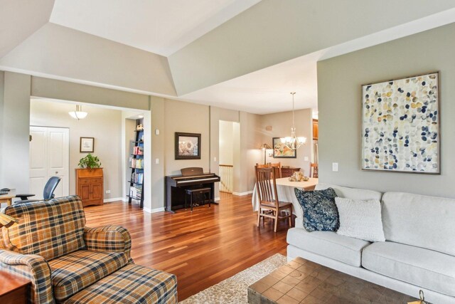 1565 Ashbury Pl, Lemont, IL 60439 - living area with baseboards, wood finished floors, and a chandelier