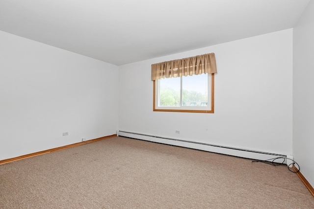 11123 S 84th Ave Unit 2B, Palos Hills, IL 60465 - carpeted empty room featuring baseboards and a baseboard heating unit
