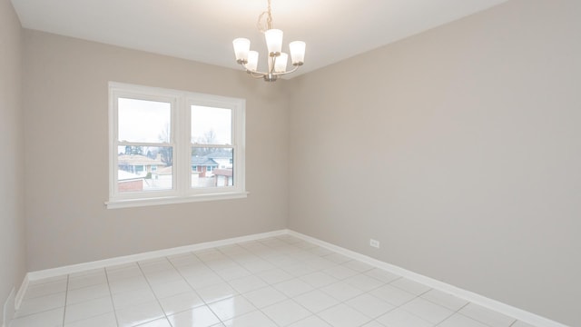 10630 W Cermak Rd Unit 2E, Westchester, IL 60154 - spare room with baseboards, a chandelier, and light tile patterned floors