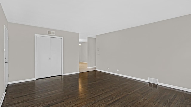 10630 W Cermak Rd Unit 2E, Westchester, IL 60154 - empty room with baseboards, visible vents, and wood finished floors