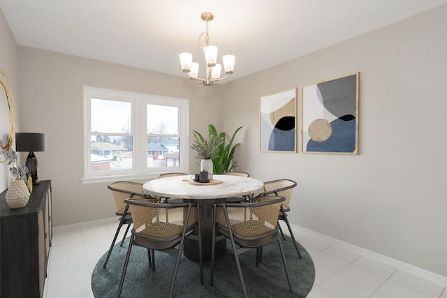 10630 W Cermak Rd Unit 2E, Westchester, IL 60154 - dining area with baseboards, light tile patterned floors, and a notable chandelier