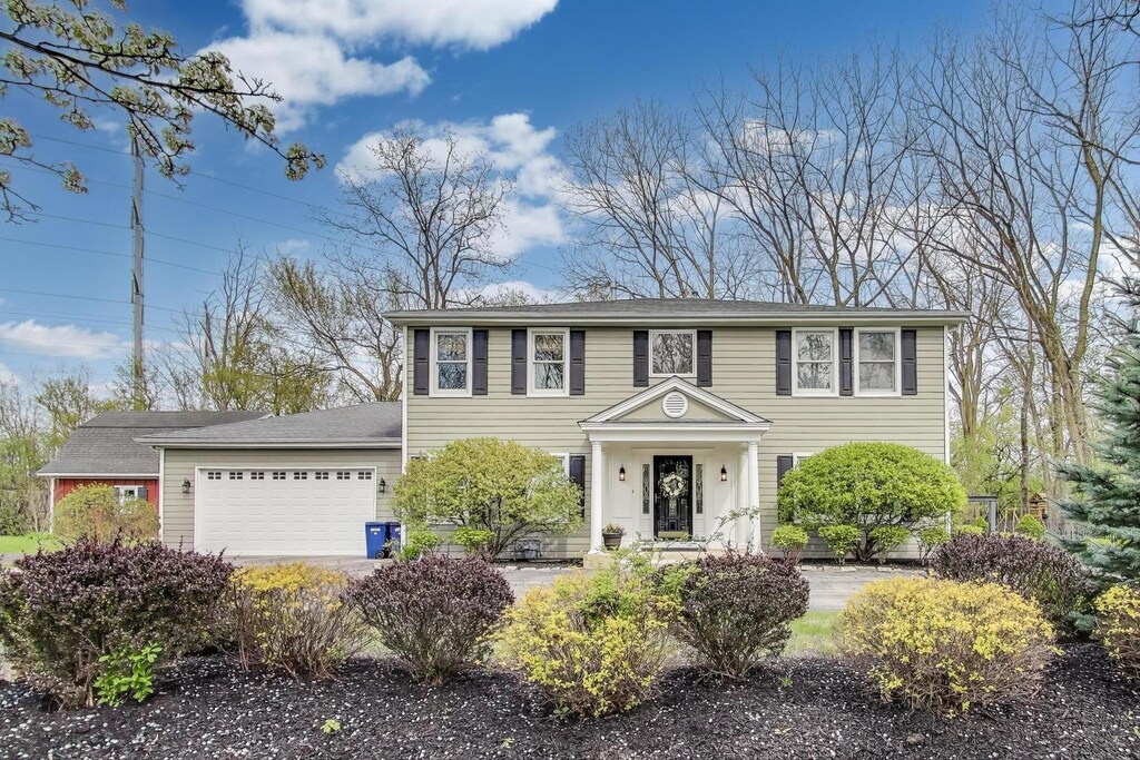 2555 Highmoor Rd, Highland Park, IL 60035 - colonial-style house with an attached garage