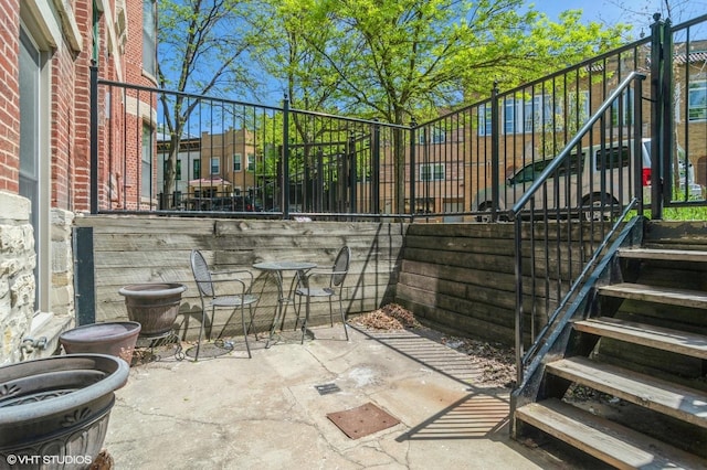 view of patio featuring stairs
