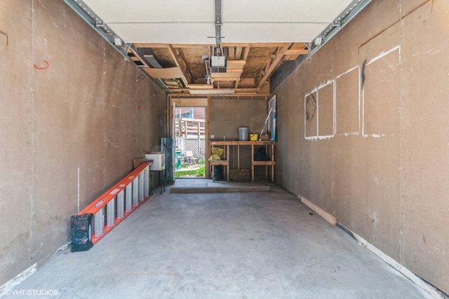 garage featuring a garage door opener