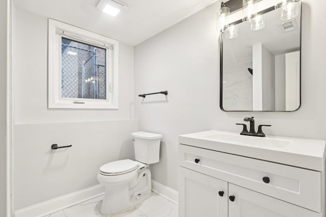 310 Muskegon Ave, Calumet City, IL 60409 - bathroom featuring visible vents, baseboards, vanity, toilet, and marble finish floor