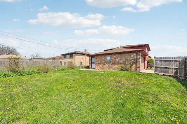 310 Muskegon Ave, Calumet City, IL 60409 - view of yard featuring a fenced backyard