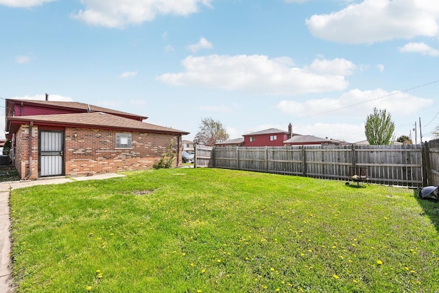 310 Muskegon Ave, Calumet City, IL 60409 - view of yard featuring a fenced backyard