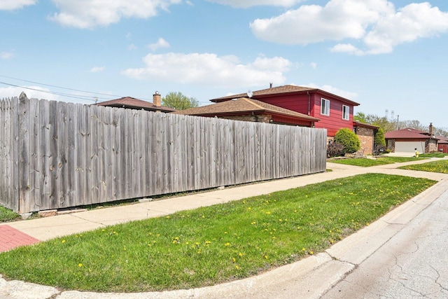 310 Muskegon Ave, Calumet City, IL 60409 - view of side of property with fence and a lawn