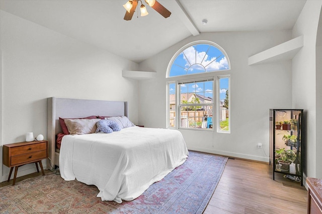 4022 Orchard Ln, Monticello, IL 61856 - bedroom with beam ceiling, light wood-type flooring, a ceiling fan, high vaulted ceiling, and baseboards