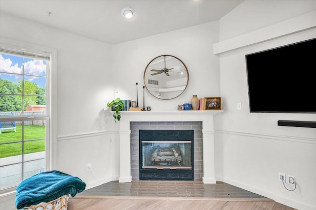 4022 Orchard Ln, Monticello, IL 61856 - living area featuring a brick fireplace, wood finished floors, baseboards, a ceiling fan, and recessed lighting