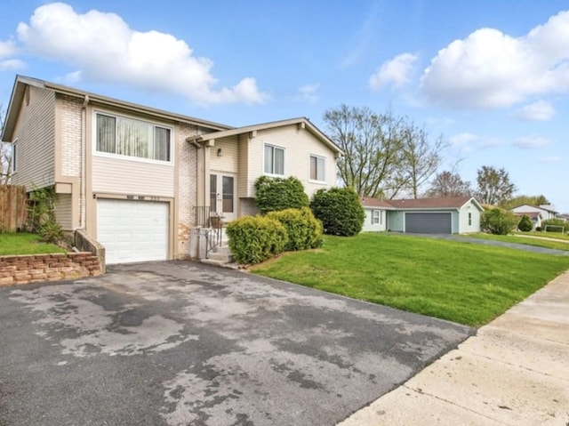 224 Lexington Dr, Bolingbrook, IL 60440 - bi-level home with driveway, brick siding, french doors, a garage, and a front yard